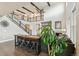 Spacious living room with tall ceilings, and a bar area at 8783 S Winnipeg Ct, Aurora, CO 80016