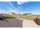 Expansive backyard showcasing well-maintained landscaping, framed garden beds, and neighborhood vistas at 4757 Augustine Ct, Castle Rock, CO 80108