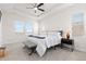Bright main bedroom with modern furniture, lots of natural light, and modern lighting at 4757 Augustine Ct, Castle Rock, CO 80108