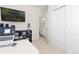 A modern office with a desk, a computer, and a shelf at 4757 Augustine Ct, Castle Rock, CO 80108