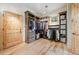 Large walk-in closet with ample shelving and hanging space at 9081 E Wesley Dr, Denver, CO 80231