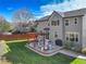 Spacious backyard with patio, pergola, and lawn at 16507 Oakmoor Pl, Parker, CO 80134