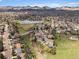 Idyllic community with a beautiful lake, green spaces, and mountain views at 10624 W Berry Pl, Littleton, CO 80127