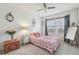 Bright bedroom with ample natural light, decorative wall accents, and a cozy atmosphere at 2864 S Jebel Way, Aurora, CO 80013