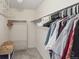 Organized walk-in closet with shelving and hanging space for optimal storage solutions at 2864 S Jebel Way, Aurora, CO 80013
