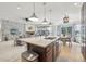 Spacious open kitchen with stainless appliances, granite countertops, ample counter space, and seamless flow to living areas at 2864 S Jebel Way, Aurora, CO 80013