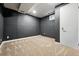 Finished basement featuring neutral carpeting, paint and trim, and a window providing natural light at 11625 Bellaire Way, Thornton, CO 80233
