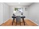 Bright bedroom space with natural light, wood floors, and a functional desk area at 11625 Bellaire Way, Thornton, CO 80233