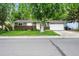 Charming single-story home with a well-manicured front lawn and attached two car garage at 11625 Bellaire Way, Thornton, CO 80233