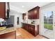 Well-appointed kitchen with granite countertops, ample cabinetry, and stainless steel appliances at 11625 Bellaire Way, Thornton, CO 80233