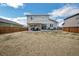 Expansive backyard featuring a patio, pergola, and privacy fence at 6954 E 117Th Ave, Thornton, CO 80233