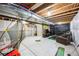 Unfinished basement with exposed ceiling, potential for customization and flexible space at 6954 E 117Th Ave, Thornton, CO 80233