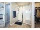 Clean bathroom showcasing a glass-enclosed shower, modern fixtures, and a walk-in closet at 6954 E 117Th Ave, Thornton, CO 80233
