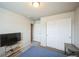 Bedroom with a closet featuring sliding doors at 6954 E 117Th Ave, Thornton, CO 80233