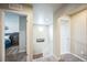 Upstairs hallway with natural light, carpeted floors, and access to multiple rooms at 6954 E 117Th Ave, Thornton, CO 80233