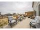 Outdoor patio with comfortable seating and a pergola, perfect for entertaining at 6954 E 117Th Ave, Thornton, CO 80233