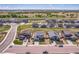 Aerial view of a modern home in a residential neighborhood with sidewalks and manicured front yards at 6954 E 117Th Ave, Thornton, CO 80233