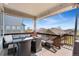 Relax on this covered deck with outdoor seating and lovely neighborhood views at 4464 E 139Th Ave, Thornton, CO 80602