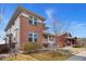 Attractive two-story home with brick facade, inviting front porch, and well-kept lawn at 4464 E 139Th Ave, Thornton, CO 80602