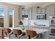 Bright kitchen with white countertops, stainless steel appliances, and modern finishes at 4464 E 139Th Ave, Thornton, CO 80602