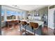 Modern kitchen with stainless steel appliances, quartz countertops, and a breakfast bar at 4464 E 139Th Ave, Thornton, CO 80602