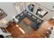 Bright and airy living room with large windows, hardwood floors, and comfortable seating at 4464 E 139Th Ave, Thornton, CO 80602
