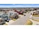 Aerial view of a well-planned suburban neighborhood with neat streets and well-maintained homes at 4464 E 139Th Ave, Thornton, CO 80602