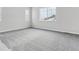 Bright bedroom with neutral walls and new carpeting at 4125 River Oaks St, Castle Rock, CO 80104