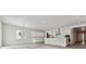 Open concept kitchen with white cabinets and an island at 4125 River Oaks St, Castle Rock, CO 80104