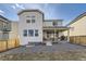 Backyard with gravel, wood fence, and covered patio at 13362 Amber Sky St, Parker, CO 80134