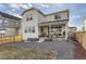 Gravel backyard and covered patio, offering privacy and relaxation at 13362 Amber Sky St, Parker, CO 80134