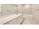 Bathroom with white cabinets and vanity at 13362 Amber Sky St, Parker, CO 80134