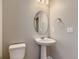 Cozy bathroom with stylish pedestal sink at 13362 Amber Sky St, Parker, CO 80134