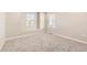 Bright carpeted bedroom with natural light at 13362 Amber Sky St, Parker, CO 80134