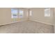 Spacious bedroom with carpet and lots of natural light at 13362 Amber Sky St, Parker, CO 80134