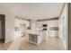 Bright kitchen with stainless appliances, recessed lights, and large island at 13362 Amber Sky St, Parker, CO 80134