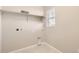 Laundry room with utility connections and window at 13362 Amber Sky St, Parker, CO 80134