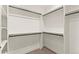 Spacious walk-in closet with ample storage and shelving for organized living at 1715 Grove St, Denver, CO 80204