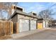 Modern home with multiple garage spaces, featuring contemporary doors and a convenient alley access at 1715 Grove St, Denver, CO 80204
