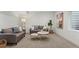 Inviting living room with modern sofas, elegant coffee tables, and tasteful decor, perfect for relaxing and entertaining at 1715 Grove St, Denver, CO 80204