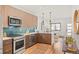 Bright kitchen and living room with open concept, stainless appliances, and inviting seating at 1715 Grove St, Denver, CO 80204