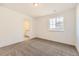 Bright bedroom with plush carpet, and a large window for natural light at 39856 Floyd St, Elizabeth, CO 80107