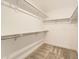 Walk-in closet with neutral carpet and wire shelving for optimal organization at 39856 Floyd St, Elizabeth, CO 80107