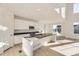 Modern kitchen featuring an island, stainless steel appliances, and an open floor plan at 39856 Floyd St, Elizabeth, CO 80107