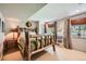 Unique bedroom featuring a log bed frame, natural light from a window, and wood accents at 10528 Applebrook Cir, Highlands Ranch, CO 80130