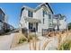 Two-story home with gray and white siding at 1998 S Poplar Ct, Denver, CO 80224