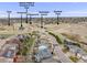 Aerial view of home and neighborhood, featuring nearby parks, baseball field, basketball courts, and community trails at 7329 Arco Iris Ln, Castle Pines, CO 80108
