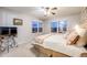 Bedroom features neutral walls, plush carpet, and great natural light at 7329 Arco Iris Ln, Castle Pines, CO 80108