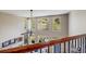 View of the living room with a ceiling fan and lots of windows at 7329 Arco Iris Ln, Castle Pines, CO 80108