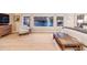 Comfortable bedroom with large windows and neutral decor, creating a relaxing space at 7329 Arco Iris Ln, Castle Pines, CO 80108